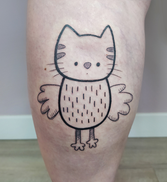 Ce que je tatoue : photographie d'un tatouage de chat ailé