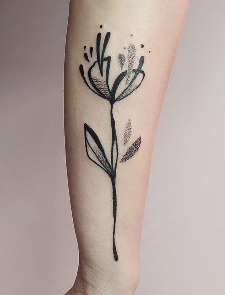 Ce que je tatoue : photographie d'un tatouage de fleur
