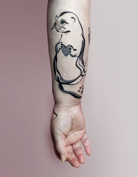 Ce que je tatoue : photographie d'un tatouage de loutre